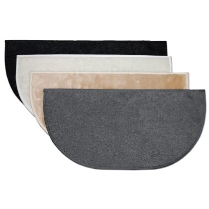 Four semi-circular doormats in black, white, beige, and gray overlap in a stack on a plain white background.