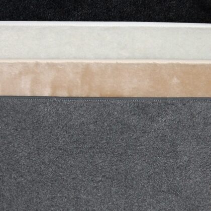 Four stacked layers in black, white, beige, and gray, each with distinct thickness and texture for cat comfort or decor.