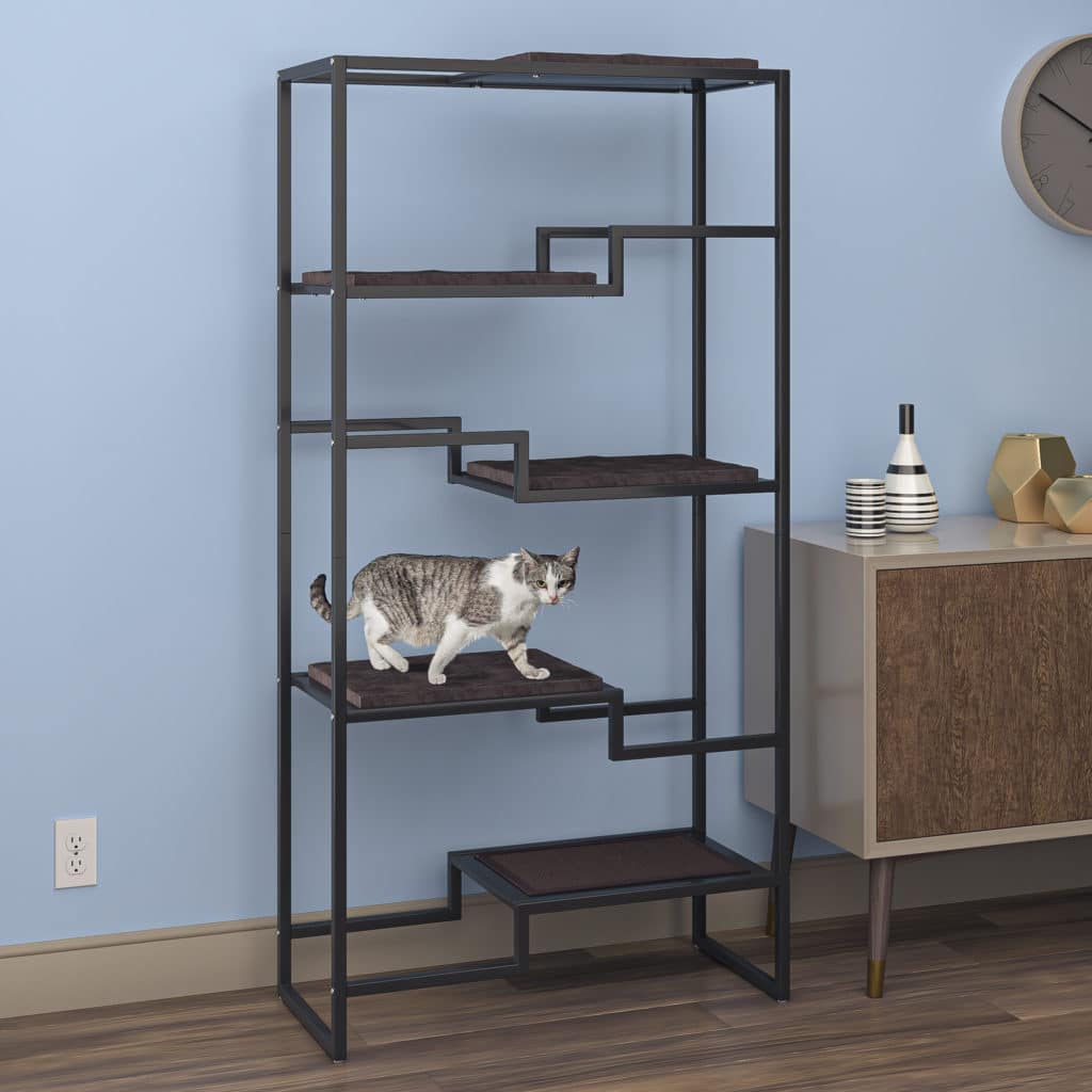 Cat on a black metal cat tower with brown cushion, in a minimalist room with light blue walls and mid-century decor.