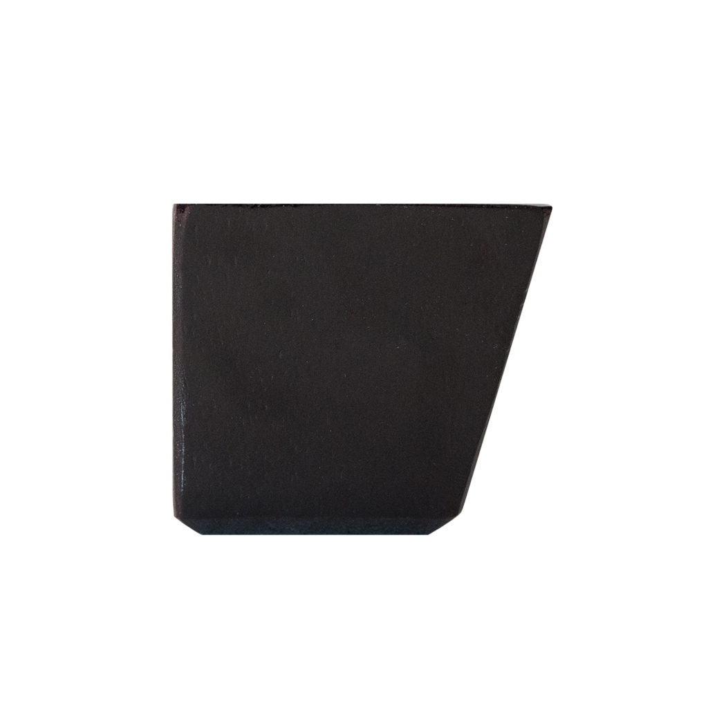 Black, asymmetrical trapezoid-shaped litter box with a dark espresso finish on a plain white background.