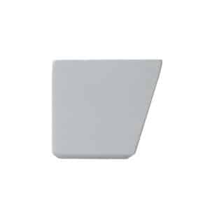 A smoke gray rectangular solid with one angled edge sits on a plain white background, resembling a modern litter box.