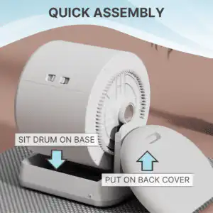 A cylindrical drum sits on a base labeled "SIT DRUM ON BASE"; an arrow points to the back cover labeled "PUT ON BACK COVER".