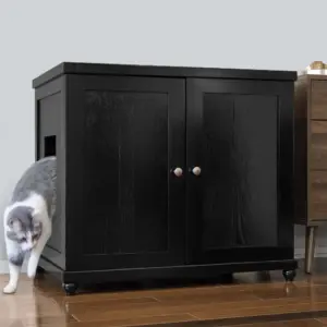 Black wooden cabinet with two doors and side opening on wooden floor, cat walking out through the side entrance.